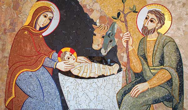 Mosaic of Mary and Joseph with baby Jesus.